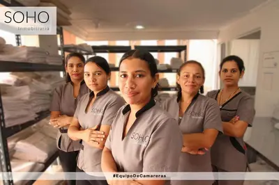 a group of women standing in a room at Apartamentos Mirador - Excelente Ubicación by SOHO in Barranquilla