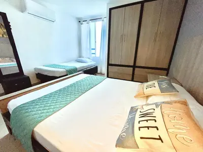 a bedroom with two beds in a room at Apartamento piso 12 y 17 Welch in Cartagena de Indias
