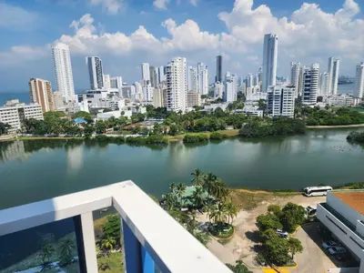 a view of a city from a balcony with a river at Cartagena El Laguito Apto cerca a la playa in Cartagena de Indias