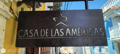 a sign for a casa las americas on a building at Hostal Casa de las Americas in Cartagena de Indias