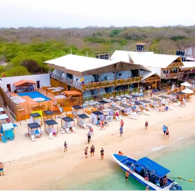 an aerial view of a beach with a resort at La Cabaña Glamping Geronimo in Playa Blanca