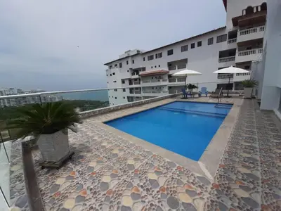 a swimming pool on the roof of a building at Bello Horizonte * Unido Al Mar in Santa Marta