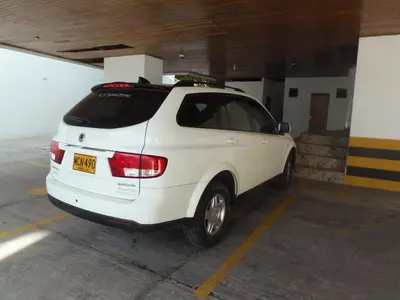 a white car parked in a parking garage at Edificio Torre Centauro in Cartagena de Indias