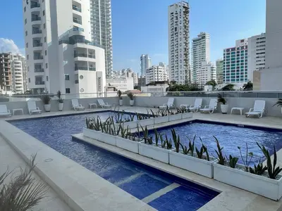 a swimming pool on the roof of a building at Apartment Lux Bocagrande in Cartagena de Indias