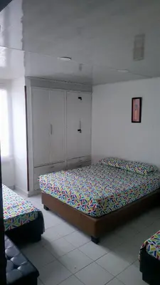 a bedroom with a bed in a room at Edificio Nuevo Conquistador in Cartagena de Indias