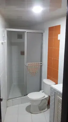 a bathroom with a shower and a toilet in it at Edificio Nuevo Conquistador in Cartagena de Indias
