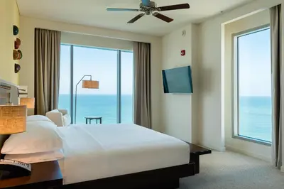 a hotel room with a bed and a large window at Hyatt Regency Cartagena in Cartagena de Indias