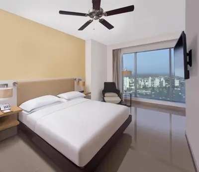 a bedroom with a bed and a ceiling fan at Hyatt Regency Cartagena in Cartagena de Indias