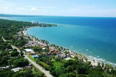 an aerial view of a beach and the ocean at Apartamentos Las Múcuras in Coveñas