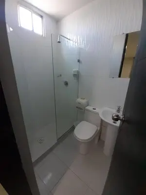 a bathroom with a shower and a toilet and a sink at Hotel La Mar Cartagena in Cartagena de Indias