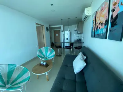 a living room with a couch and a table at Apartamentos en Morros Cartagena in Cartagena de Indias