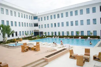 an image of the pool at a hotel at Hotel Las Olas Mamonal in Cartagena de Indias