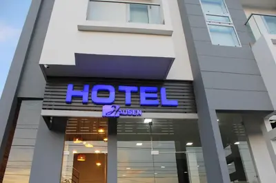 a hotel sign on the front of a building at Hotel Hausen in Lorica