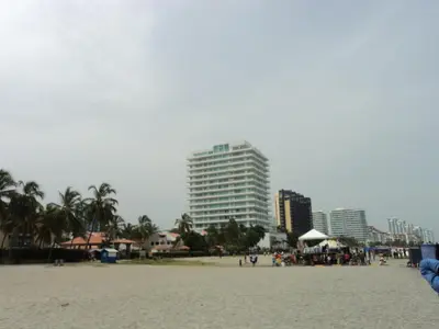a view of a beach with buildings in the background at Edificio Mar de Leva in Santa Marta