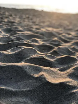 a close up of sand on a beach at Costa de Vikingos in Tolú