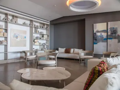 a living room with couches and tables and chairs at Namaste Alojamientos Luxury Cartagena in Cartagena de Indias