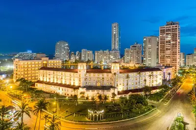a large building in a city at night at Hotel Caribe by Faranda Grand, a member of Radisson Individuals in Cartagena de Indias