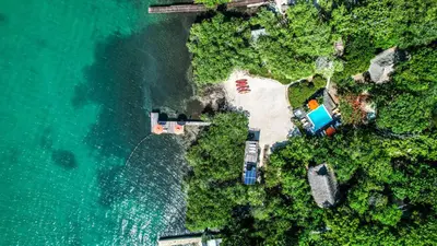 an aerial view of a beach and the ocean at Hotel Playa Scondida Barú in Baru