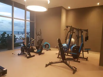 a gym with several exercise bikes in a room at Morros City - Frente al mar in Cartagena de Indias