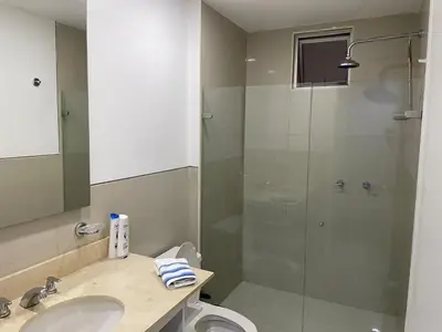 a bathroom with a shower and a sink and a toilet at Apartamento Cartagena Morros Epic 23 in Cartagena de Indias