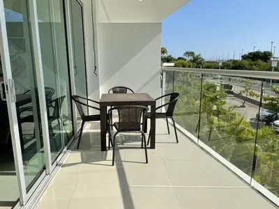 a table and chairs on the balcony of a building at Apartamento Cartagena Morros Epic 23 in Cartagena de Indias