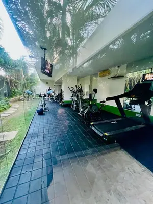 a gym with bikes and exercise equipment in a building at MORROS VITRI Luxury in Cartagena de Indias