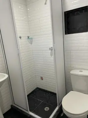 a bathroom with a shower and a toilet at Casa Vecchio in Cartagena de Indias