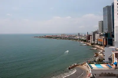 an aerial view of a beach with buildings and the ocean at Apartamentos Morros City Cartagena in Cartagena de Indias