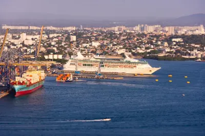 a cruise ship is docked in a harbor at 41st Fl Beach Condo in Bocagrande in Cartagena de Indias