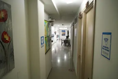 a hallway of a hospital with a hallwayngth at Hotel Sun River in Barranquilla