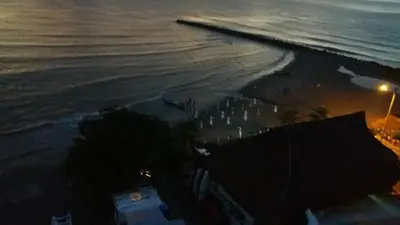 an aerial view of the beach at night at Caribe a Vista in Cartagena de Indias
