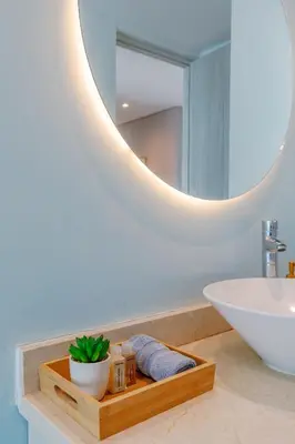a bathroom with a sink and a mirror at Escapada 5 estrellas frente al mar - sonest morros in Cartagena de Indias