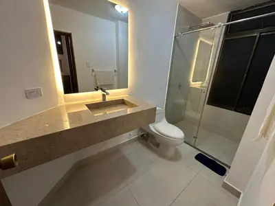 a bathroom with a sink and a toilet and a shower at Casa Miramar in Santa Marta
