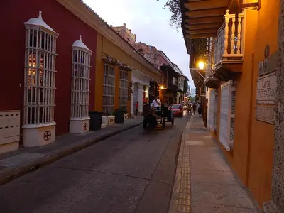 an empty street in an old town at night at Edificio Morros Vitri in Cartagena de Indias