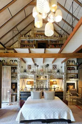 a bedroom with a large bed in a room at Hotel Casa Lola Deluxe Gallery in Cartagena de Indias