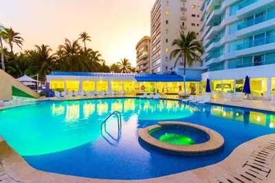 a large swimming pool in front of a building at Hotel Dann Cartagena in Cartagena de Indias