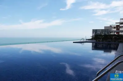 a bridge over a body of water with buildings at Apartamento Encantador - H2 Condominio in Cartagena de Indias