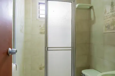 a bathroom with a shower and a toilet at Hotel Veleros Cartagena in Cartagena de Indias
