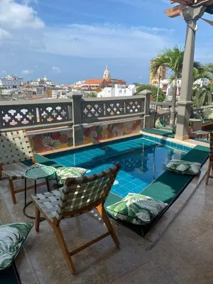 a swimming pool on the roof of a building at Townhouse Boutique Hotel in Cartagena de Indias
