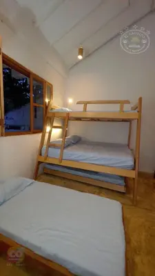 a bedroom with two bunk beds in a room at Casa de Playa Moñitos Laguito in Moñitos