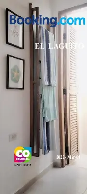 a room with some towels hanging on a wall at Casa de Playa Moñitos Laguito in Moñitos