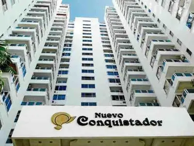 a large white apartment building with a nivex condominium at Apartamentos Cartagena in Cartagena de Indias