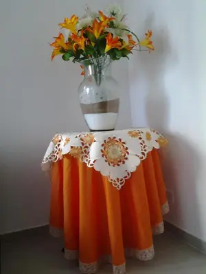 a vase filled with flowers sitting on top of a table at Apartamentos Cartagena in Cartagena de Indias