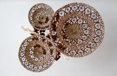 a pair of earrings with patterns on them at Hotel Iraka Zenu in Sincelejo