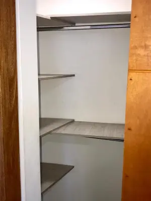 a walk in closet with shelves in it at Apartamentos Cartagena Caribe Suite in Cartagena de Indias