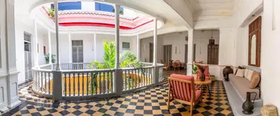 a large room with a lobby with a checkered floor at La Passion by Masaya Collection in Cartagena de Indias