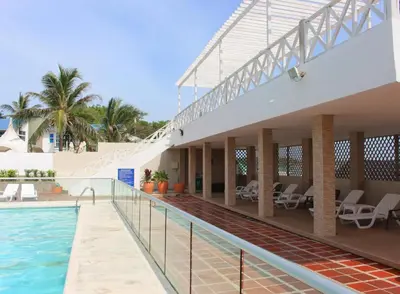 a view of the swimming pool at a resort at Hotel Dorado Plaza Punta Arena in Tierra Bomba