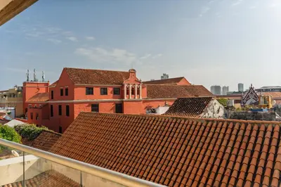 a view of a group of buildings with red roofs at Nacar Hotel Cartagena, Curio Collection by Hilton in Cartagena de Indias