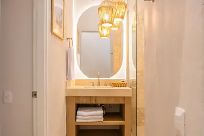 a bathroom with a sink and a mirror at Hotel Casa La Mantilla by Faranda Boutique in Cartagena de Indias