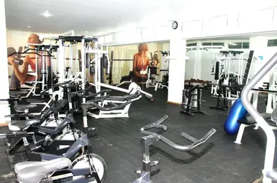 a gym with lots of cardio equipment in it at Apartamentos Morros Cartagena in Cartagena de Indias